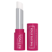 Slightly angled view of the open Retinol Eye Stick, showing both the stick and cap.