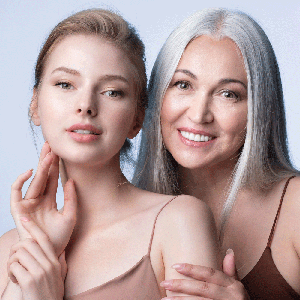 two woman smiling