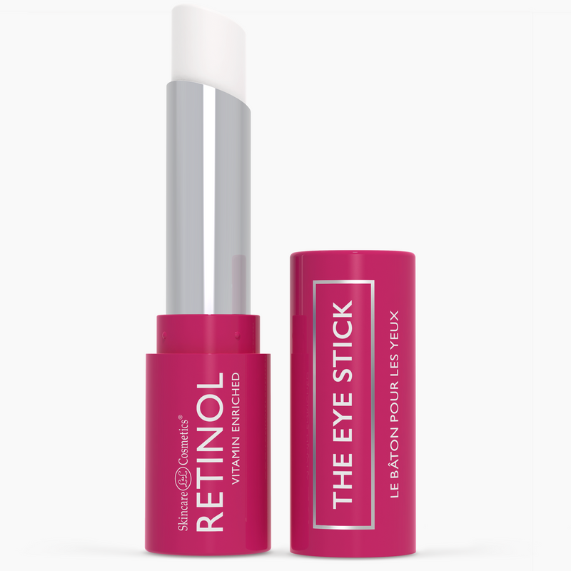 Open tube of Retinol Vitamin Enriched Eye Stick in vibrant pink packaging with white balm exposed.